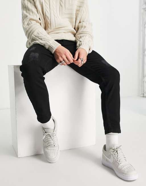 Threadbare - Stevige distressed jeans met smaltoelopende wortelpijpen in zwart