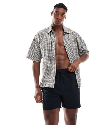 swim shorts in black seersucker
