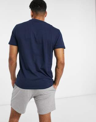 grey shorts navy blue shirt