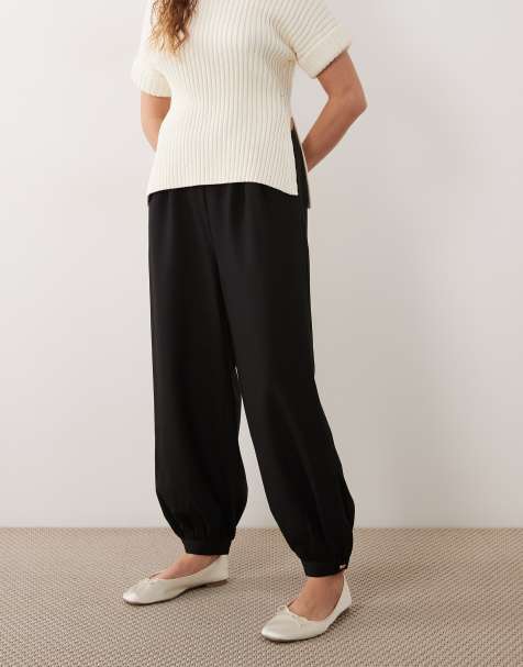 Threadbare woven twill balloon trousers with button cuffs in black - view 1