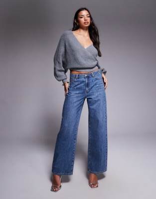 Tiger Mist - Elira - Gerade geschnittene Jeans mit Ösen-Nietenverzierung, niedrig- bis mittelhohem Bund und Waschung in ...