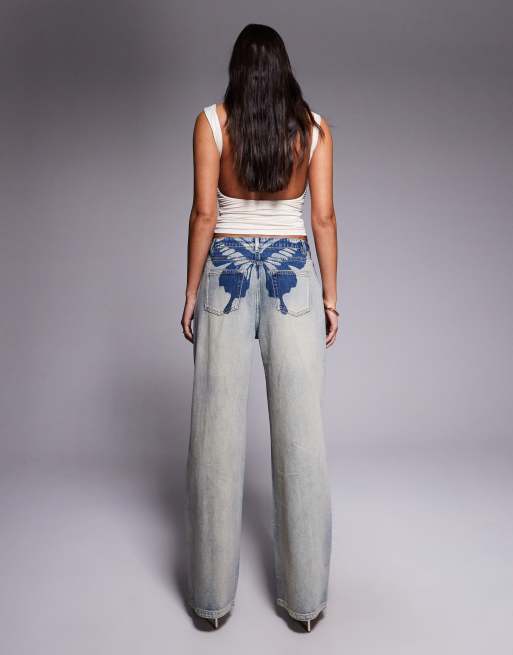 Tiger Mist Zanthe butterfly print low-mid rise oversized straight leg jeans in light wash denim, 2 of 5