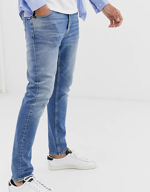 Grisling Typisk cirkulære Tiger Of Sweden Jeans Evolve slim tapered fit jeans in light wash | ASOS