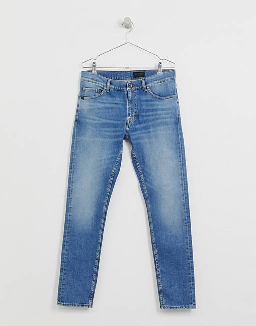 Krympe vakuum Råd Tiger Of Sweden Jeans Evolve slim tapered fit jeans in light wash | ASOS