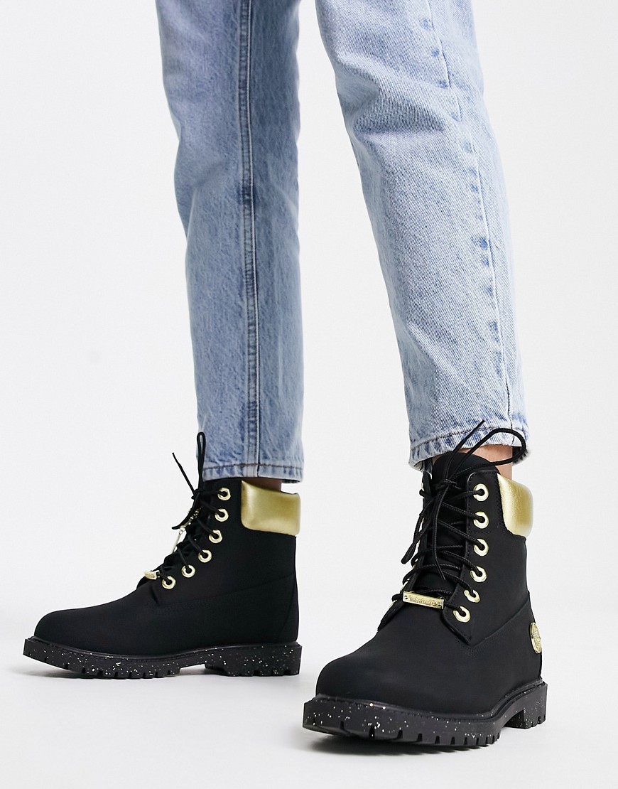 Timberland 6 inch Heritage cupsole boots in black and gold