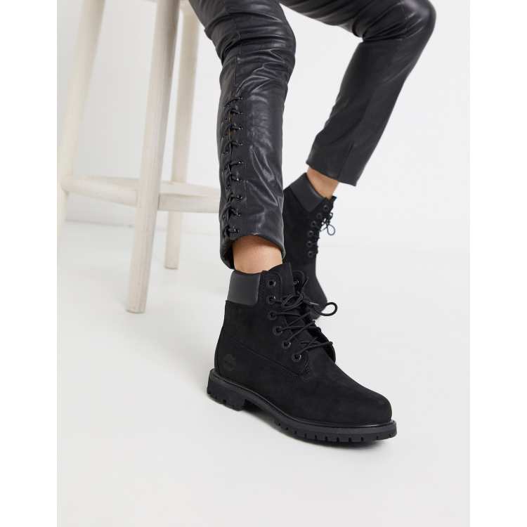 Timberland 6 inch premium lace up flat boots in black ASOS