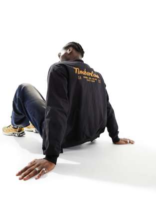 Timberland utility varsity bomber jacket with back print in black - ASOS Price Checker