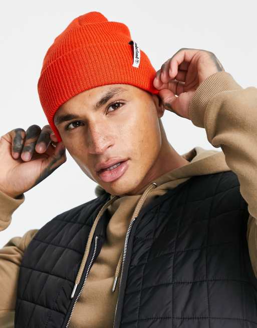 Timberland Brand Mission Loop Label beanie in orange | ASOS