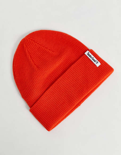 Timberland Brand Mission Loop Label beanie in orange | ASOS