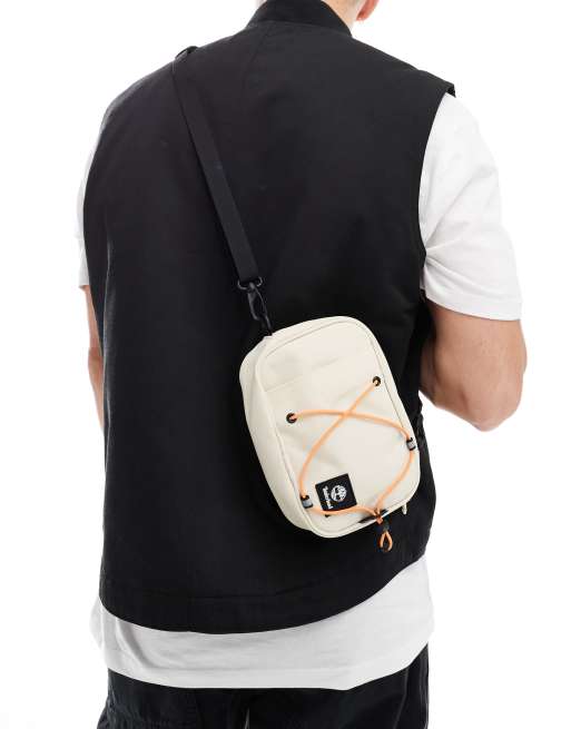 Timberland bungee logo sling bag in off white