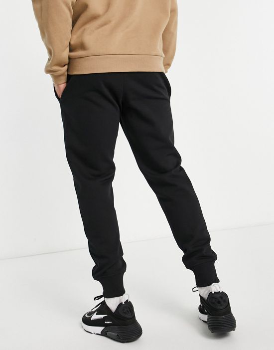 https://images.asos-media.com/products/timberland-core-tree-logo-sweatpants-in-black/201751879-2?$n_550w$&wid=550&fit=constrain