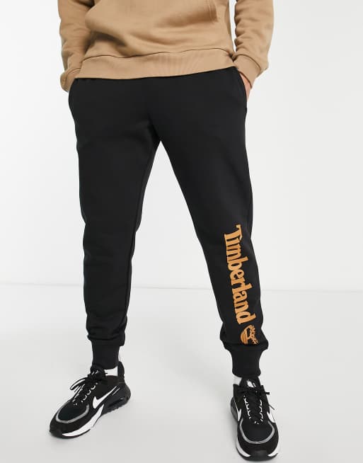 Timberland Core Tree logo trackies in black ASOS