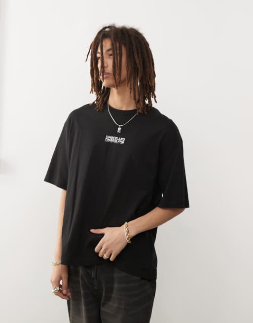 Timberland – Czarny T-shirt oversize z powtarzanym logo – tylko w ASOS, 2 z 4