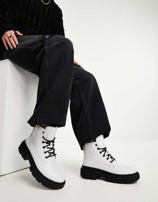 Black timberlands outlet white sole