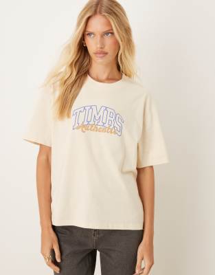 Timberland - Kurzärmliges T-Shirt in Beige mit College-Grafik-Weiß