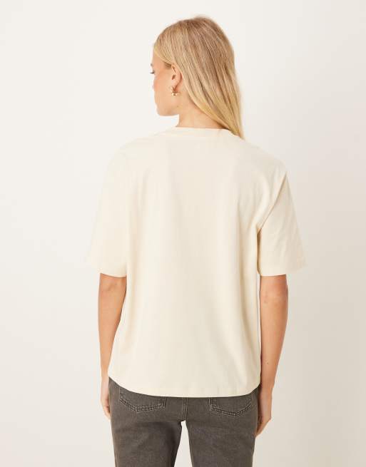 Timberland – Kurzärmliges T-Shirt in Beige mit College-Grafik, 4 von 4