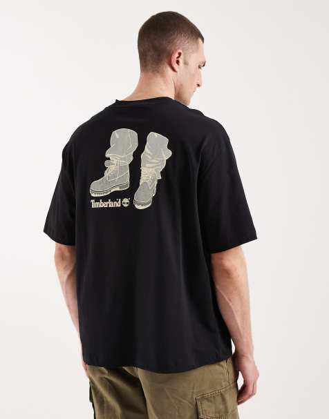 Timberland – Kurzärmliges T-Shirt in Schwarz mit „Timbs On My Footes“-Grafik - view 1