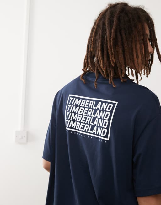Timberland - Marineblå oversized T-shirt med gentaget logo - Kun hos ASOS
