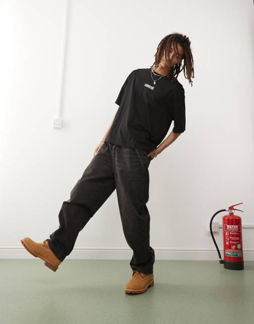 Timberland oversized t-shirt with repeat logo in black - Exclusive to ASOS, 3 of 4