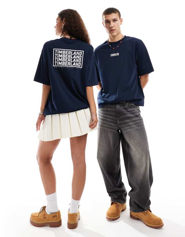 Timberland - oversized  t-shirt with repeat logo in navy blue - exclusive to asos