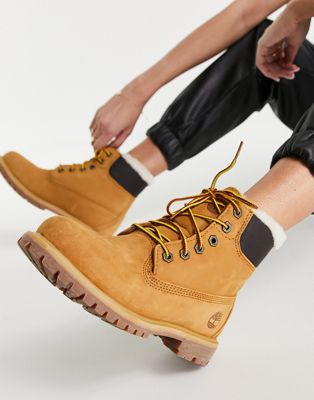 Timberland Premium Shearling lace up boots in wheat tan