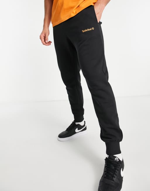 Timberland small logo print joggers in black