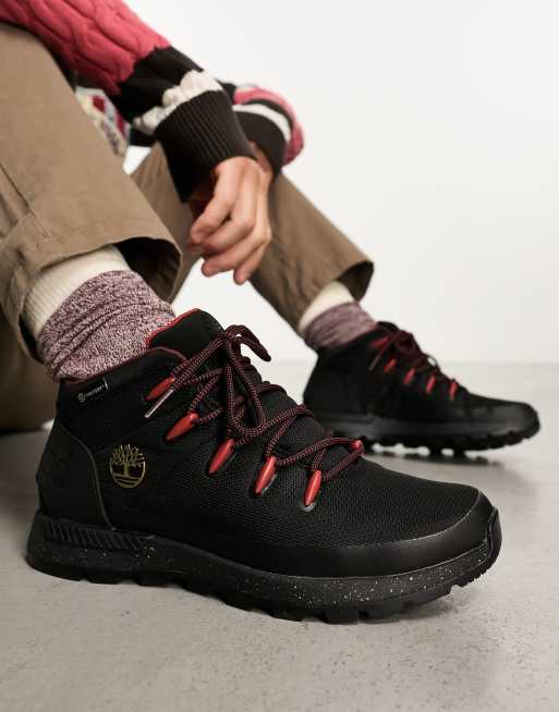 Timberland black deals and red boots