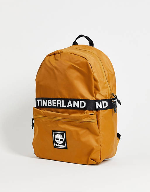 Men Timberland Strip Logo backpack in wheat tan 