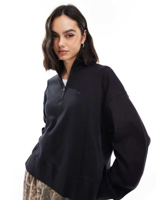 Timberland – Sweatshirt in Schwarz mit kurzem Reißverschluss
