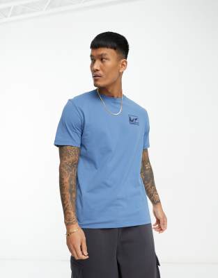 T-shirt blu con stampa di montagne sul retro - Timberland T-shirt donna  - immagine2