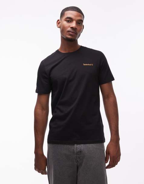 Timberland – T-Shirt in Schwarz mit kleinem Logo-Schriftzug auf der Brust - view 1