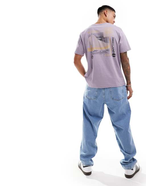Timberland - T-shirt lilla con stampa di scarponcino sul retro