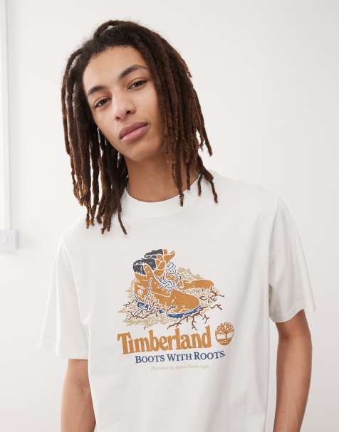 Timberland - T-shirt met grafische Boots With Roots-print in wit - view 1