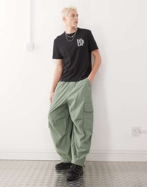Timberland - T-shirt nera con stampa del logo e scatola di scarpe, 3 di 4