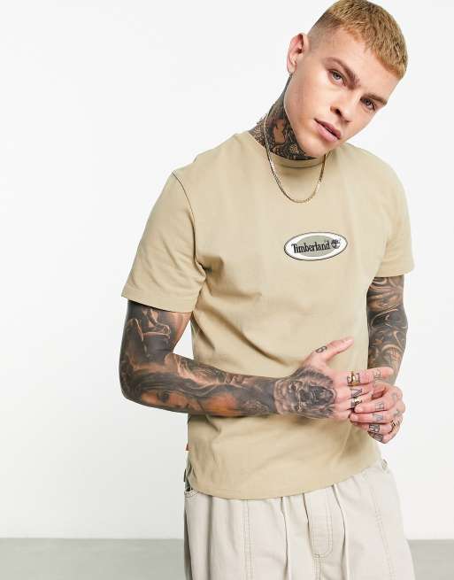 Timberland - T-shirt premium pesante marrone con logo centrale ovale