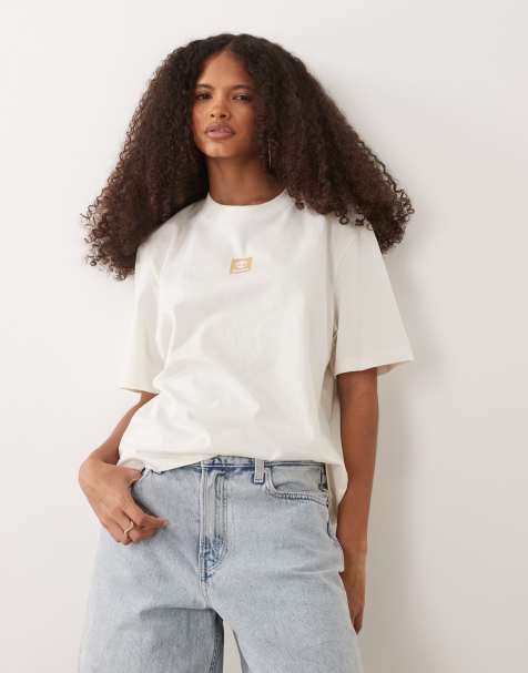 Timberland – Timberland® – Kurzärmliges T-Shirt in Vintage White mit Stappellogo - view 1