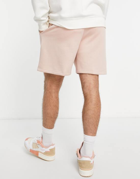 https://images.asos-media.com/products/timberland-woven-badge-sweat-shorts-in-pink/201751936-2?$n_550w$&wid=550&fit=constrain