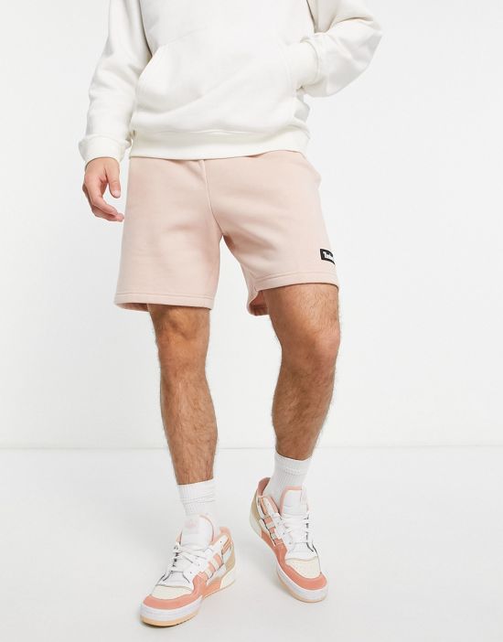 https://images.asos-media.com/products/timberland-woven-badge-sweat-shorts-in-pink/201751936-4?$n_550w$&wid=550&fit=constrain