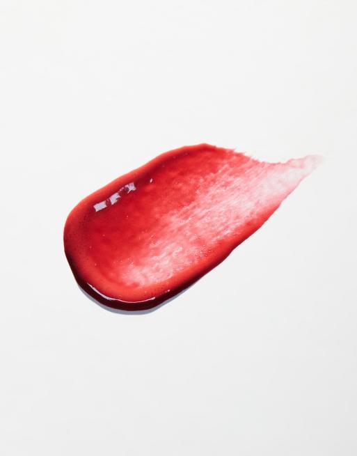 Tinte de labios Pout Tint de Revolution: Tono Sizzlin Red, 2 de 4