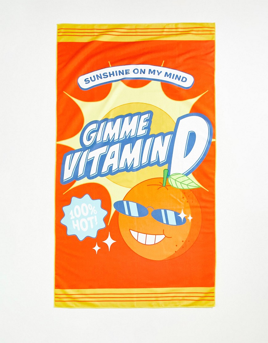 toalla naranja con diseño de texto "vitamin d" de skinnydip