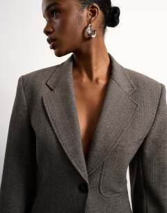 Model wearing Tolu Coker x Topshop cinched 80s blazer in taupe