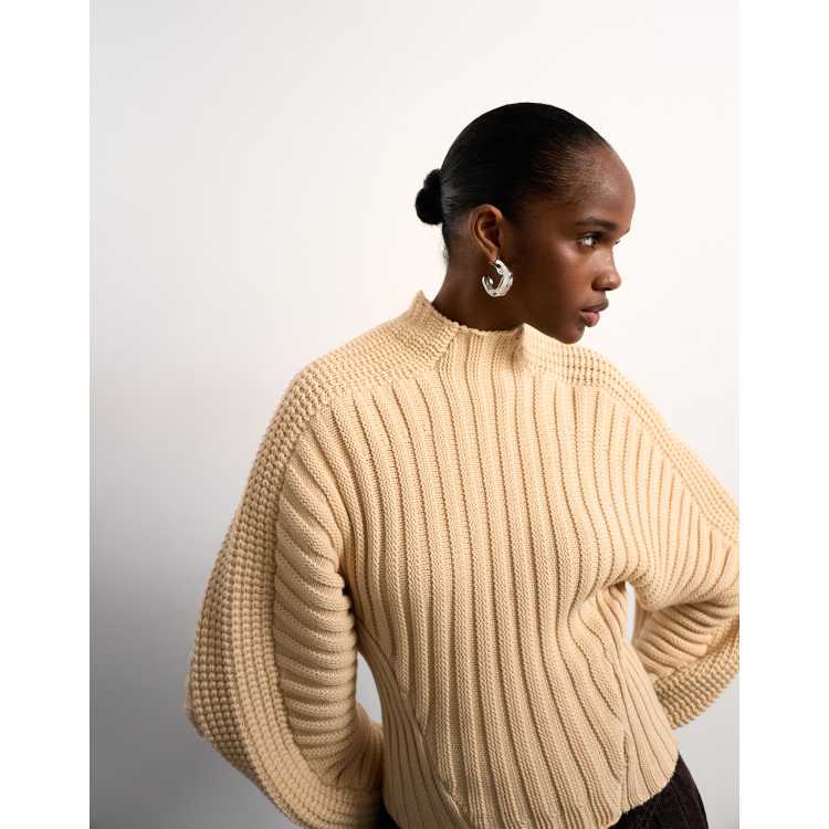 Tolu Coker x Topshop knitted ovoid sleeve jumper in beige | ASOS