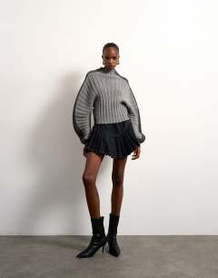 Model wearing Tolu Coker x Topshop knitted premium 100% lambswool ovoid sleeve jumper in grey