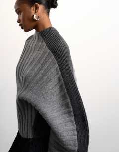Model wearing Tolu Coker x Topshop knitted premium 100% lambswool ovoid sleeve jumper in grey