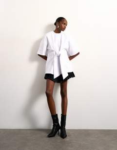 Model wearing Tolu Coker x Topshop seam tie detail tee design in ecru
