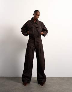 Model wearing Tolu Coker x Topshop&nbsp;barrel denim jacket circular design in brown rinse