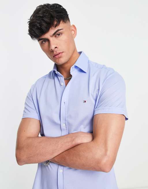 Tommy Hilfiger 1985 - Camicia slim a maniche corte in piqué con logo iconico, colore azzurra