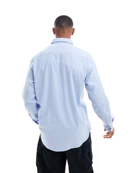 Tommy Hilfiger 1985 flex oxford regular fit shirt in blue | ASOS