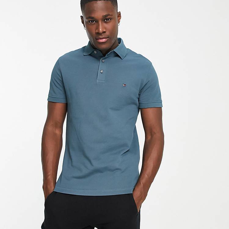 Tommy Hilfiger 1985 icon logo slim fit pique polo in blue | ASOS