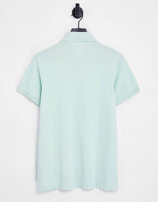 Tommy Hilfiger 1985 icon logo slim fit pique polo in mint green | ASOS